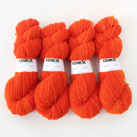 DK Superwash Merino Boucle Wool 100g in colour Carrot